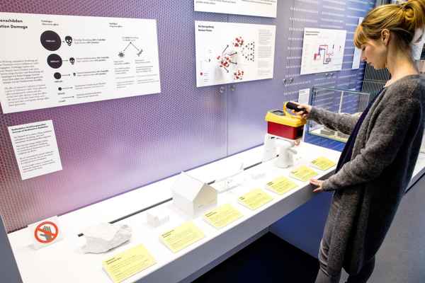 Clear honeycomb panel backdrop behind an interactive display