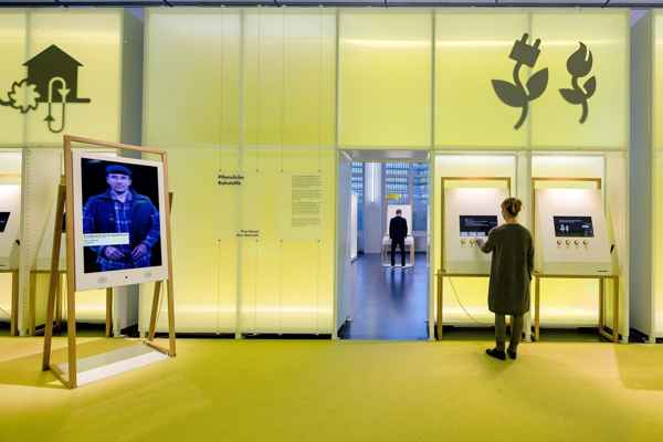 Room-scale satin panel walls softly backlit in yellow